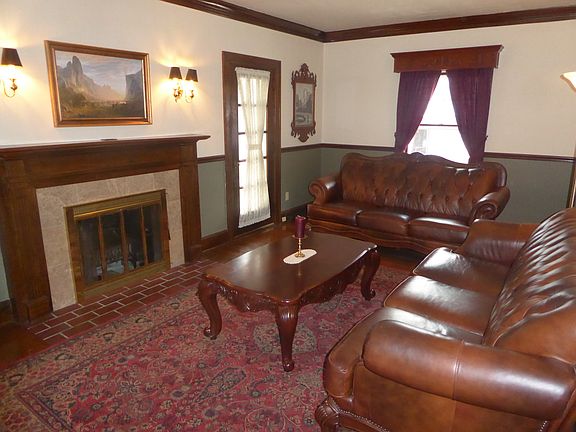 Living room with doors to screenporch
