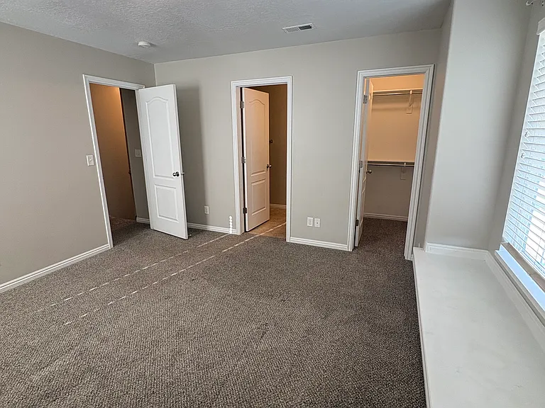 Primary Bedroom with Window Seat, Walk in Closet, and Full Bath