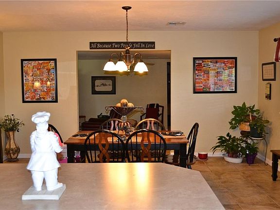 View of the dining area/living/family room from the kitchen.