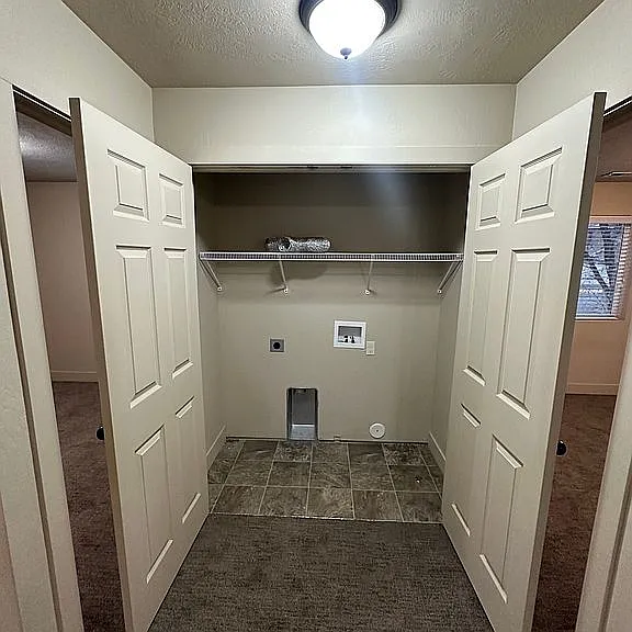 Laundry closet at the end of the hall.