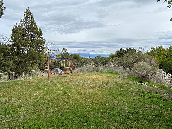 Large yard with swing set