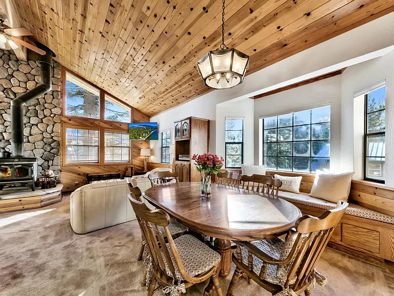 Dining area with relaxing window sitting area.