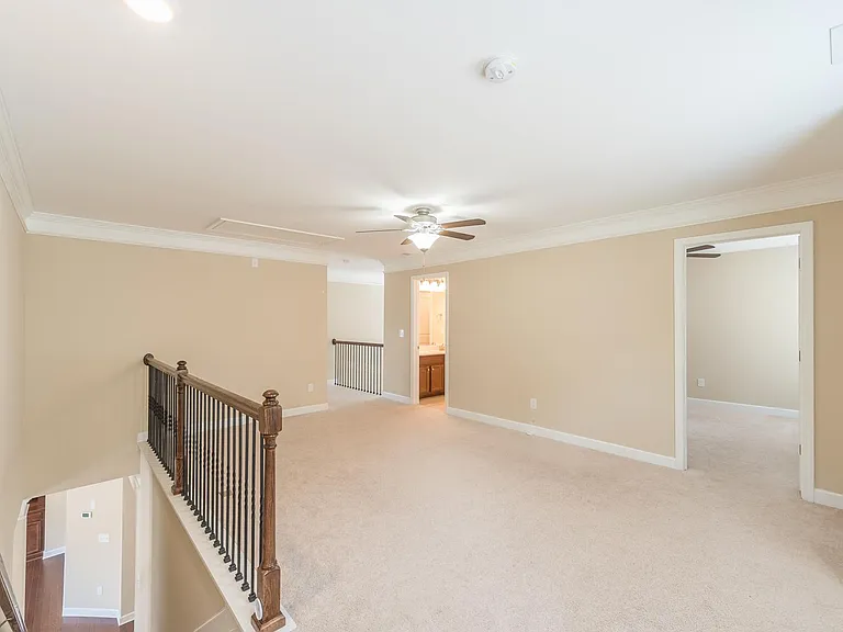 Game room on 2nd floor when walking up the stairs from the 1st floor
