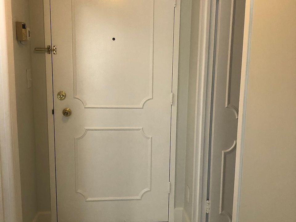 Entrance Foyer - Kitchen on the left. Laundry Room on the Right.