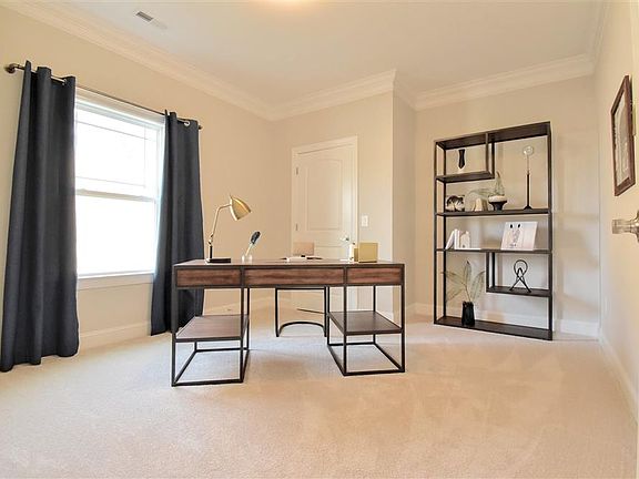 Second bedroom furnished as office