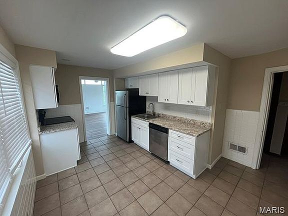 3rd image of 9010 Eden Ave