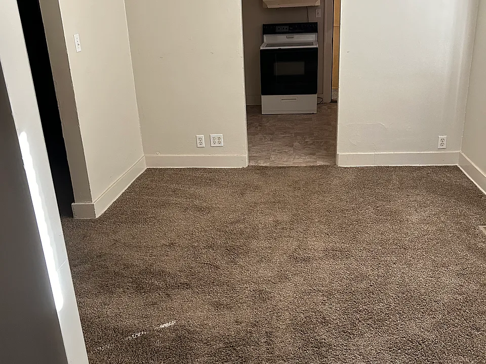Looking from Living room through Dining room to kitchen