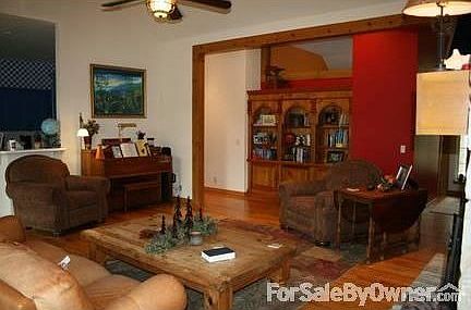Living Room
						:
						Wood floors w/built-in bookshelves