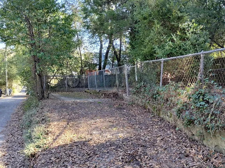 The 1 car driveway off the alley