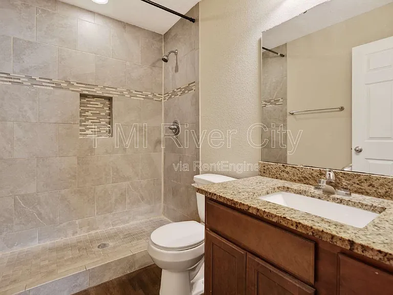 7608 Rain Forest Dr N — Photo 26
