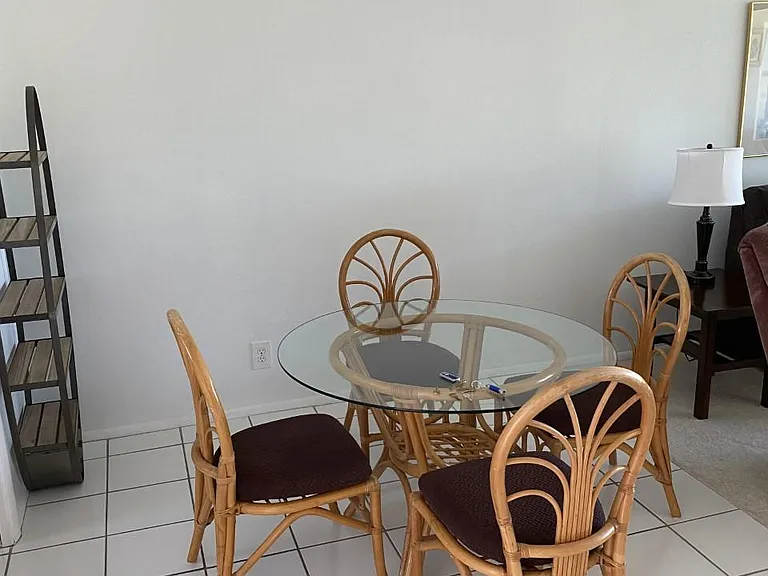 Jasmine Dining area on white tile