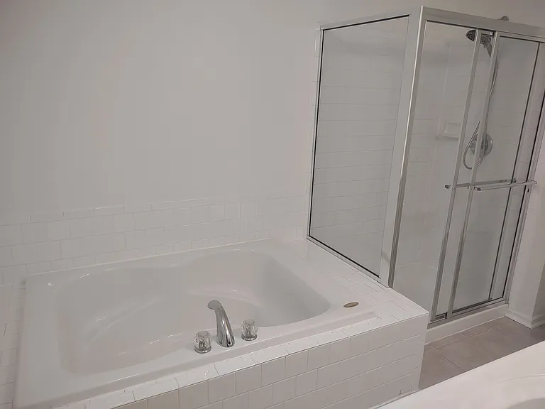 On suite with soaking tub and separate shower