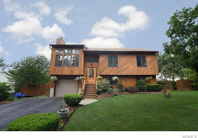 Contemporary home on professionally landscaped lot.