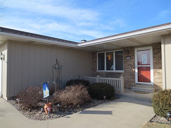 Exterior front-close up of porch and landscaping