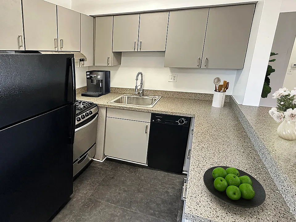 Today's kitchen designed for easy care with breakfast bar, no fuss flooring.