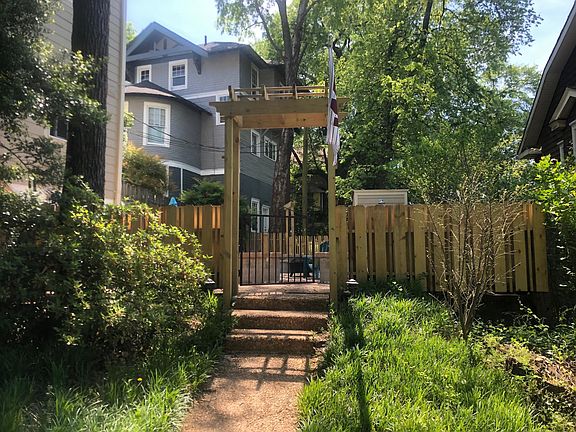 Arbor entrance to fire pit area