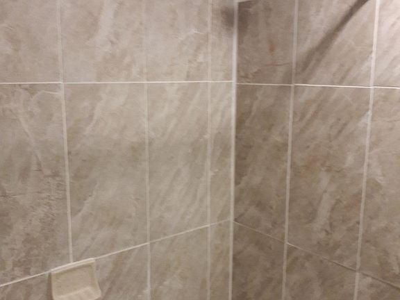 new fixtures and tile in bathroom