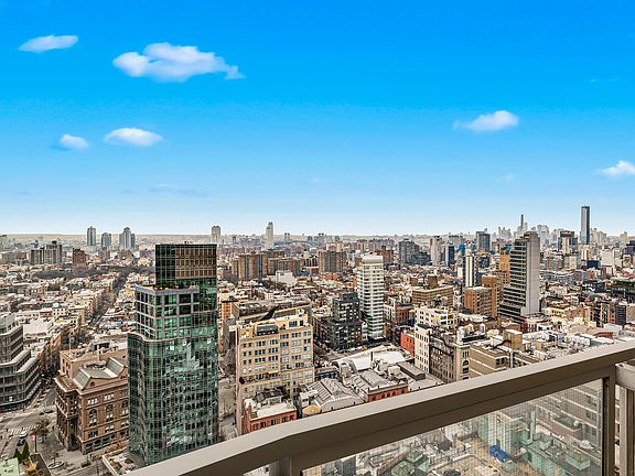 4th image of 60 E 8th St APT 32M