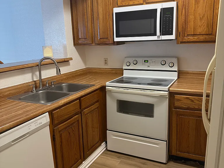 Kitchen with all appliances.