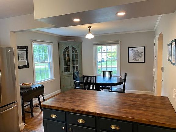 kitchen nook/eating area with built in cabinets