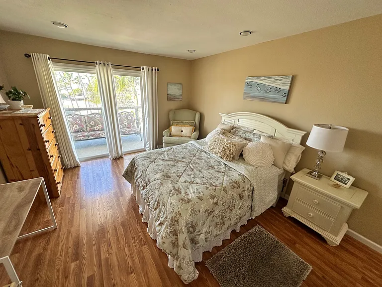 Access to balcony with seating and fire table for gorgeous views of ocean and harbor