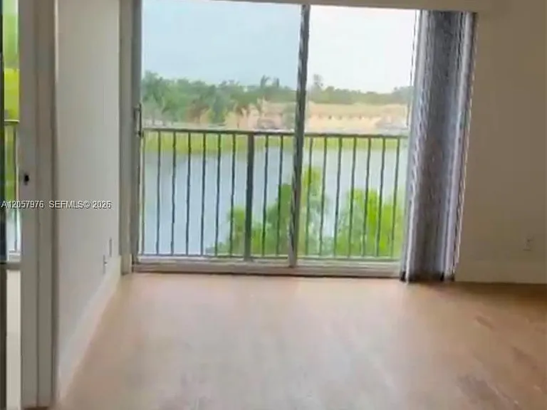 8560 N Sherman Cir #401 — Photo 2