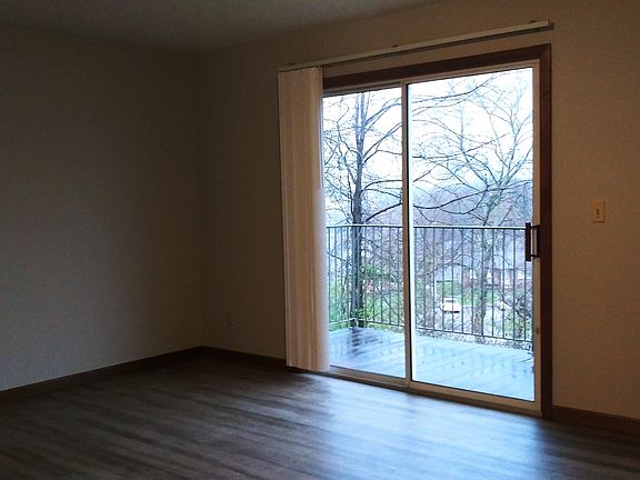 living room opens to patio