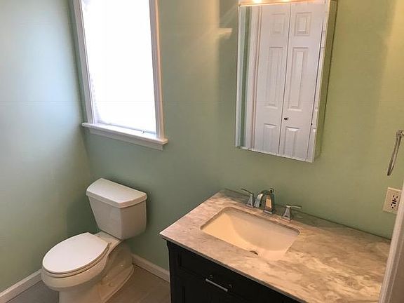 Downstairs modern bathroom with shower.
