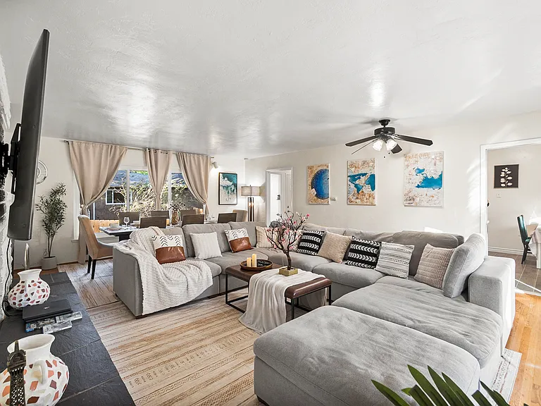Step into comfort! Our cozy living room is perfect for relaxation together.