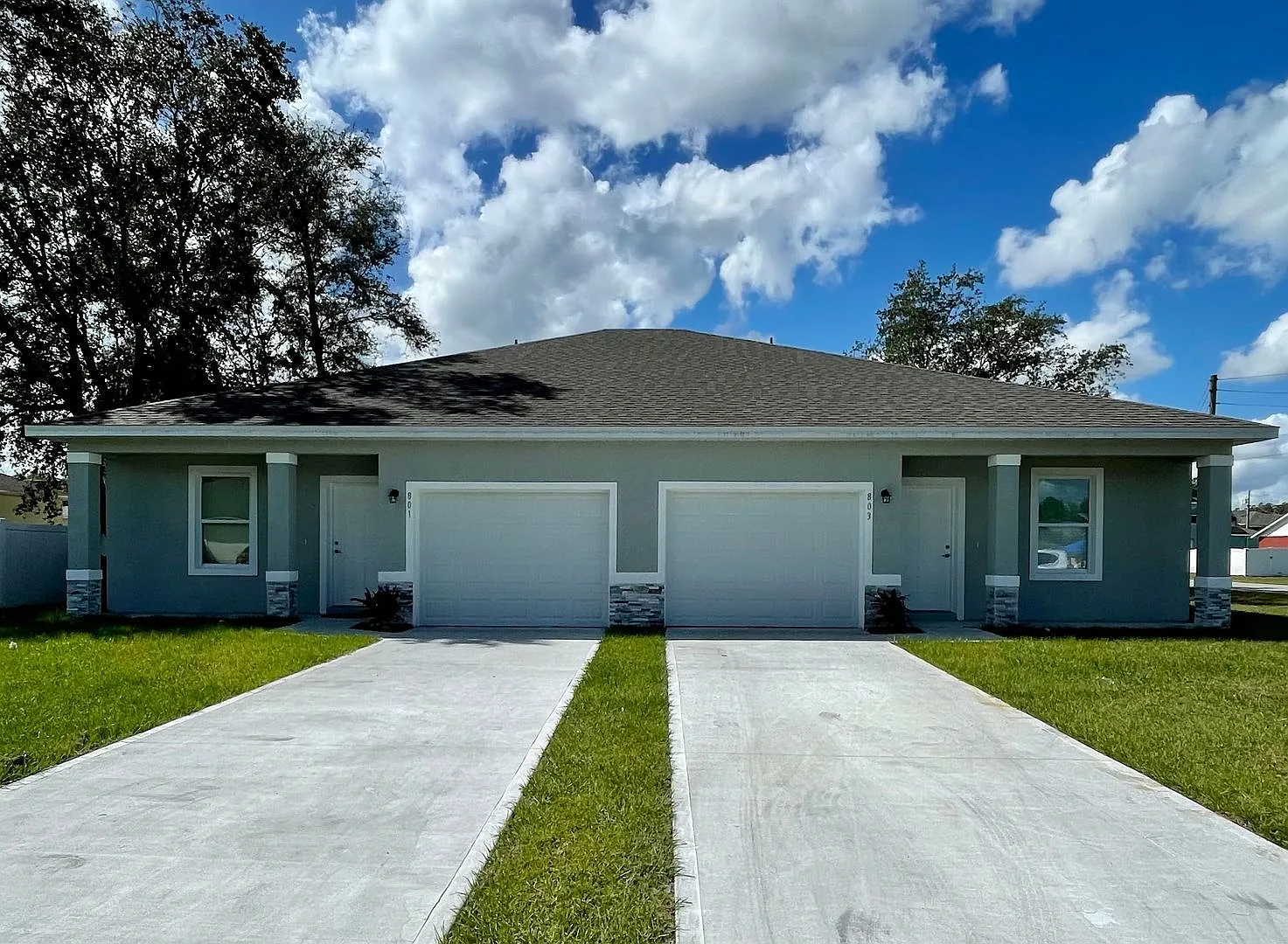 Nearly New Luxury 3-Bedroom Home with Designer Upgrades in Poinciana! — Photo 1