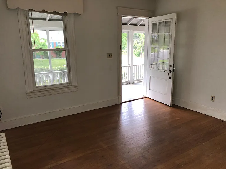 Living Room off front porch, hardwood flooring