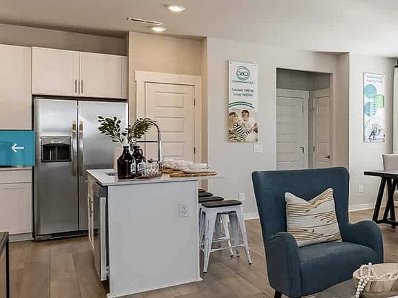Kitchen with quartz counters, pantry and gas stove
