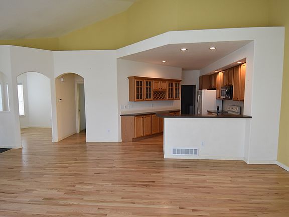 beautiful open kitchen with hardwood on main level