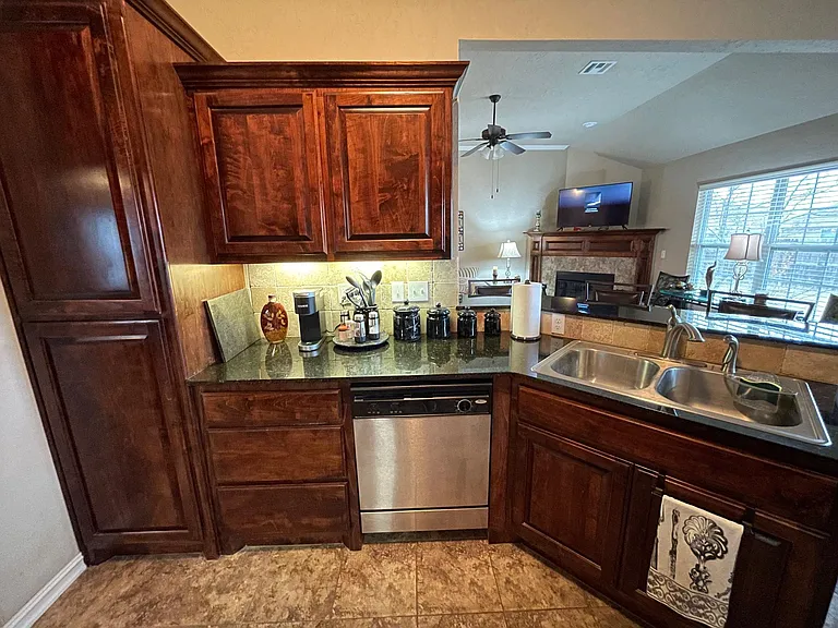 Beautiful kitchen is entertainers delight with generous counter space and tons of cabinets/storage plus a pantry.