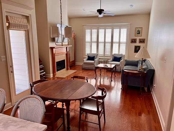Open dining and living room with 16ft ceilings