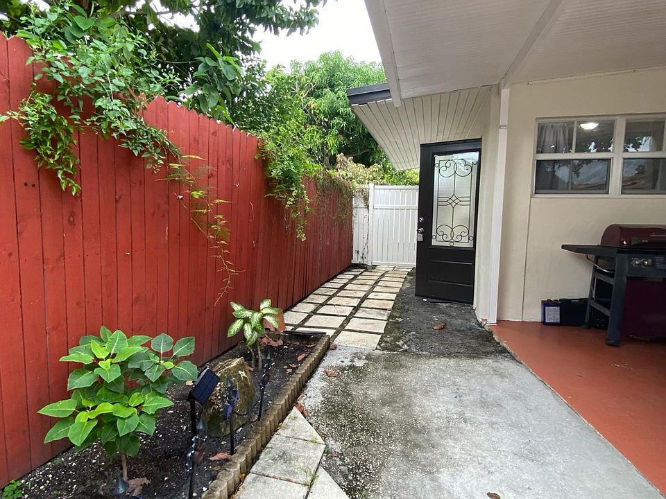 The separate entrance is attached to the back of the house and is very private.