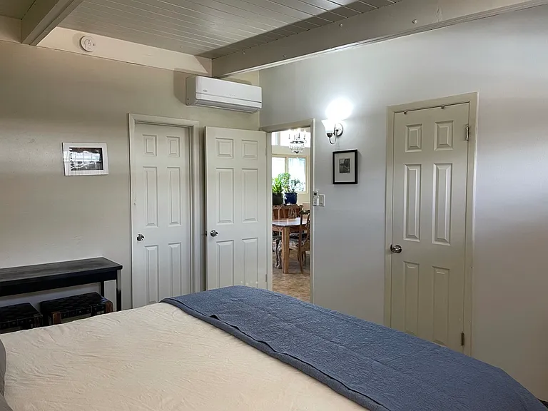 First bedroom, the doors from left to right: Walk-in closet, dining room, bathroom.