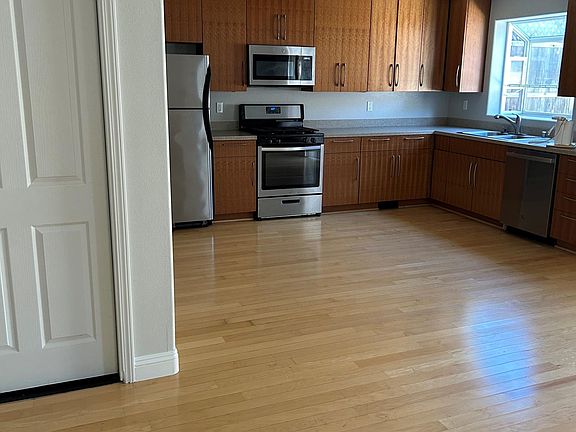 the door to the left is from the garage into the living area and kitchen