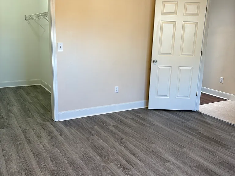 Bedroom. Closet door open.