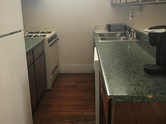 Galley Kitchen when you walk into the apartment; gas stove and oven, dishwasher, refrigerator