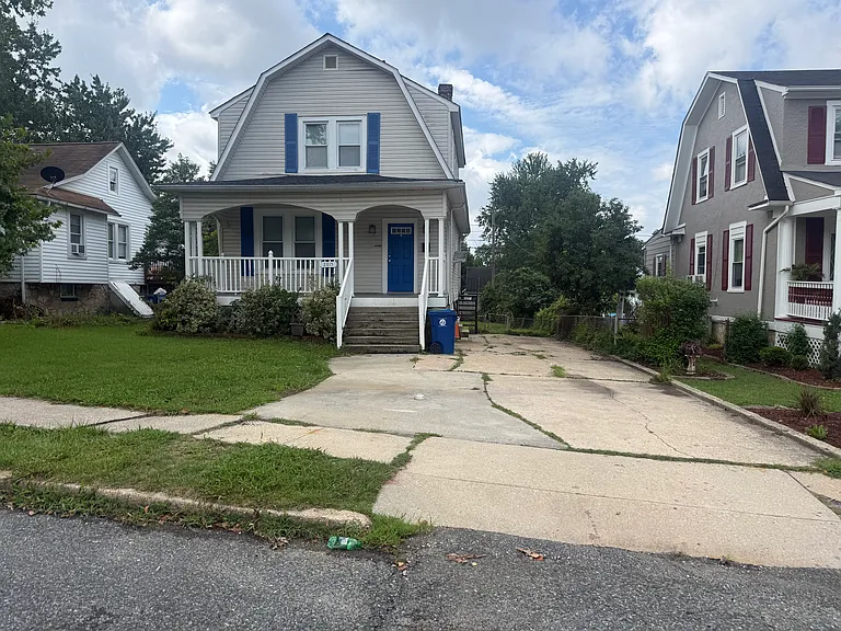 Front with 4 car off street parking.