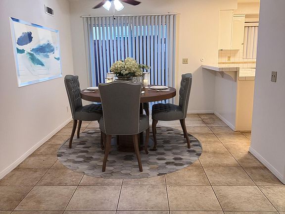 *Virtually staged dining room