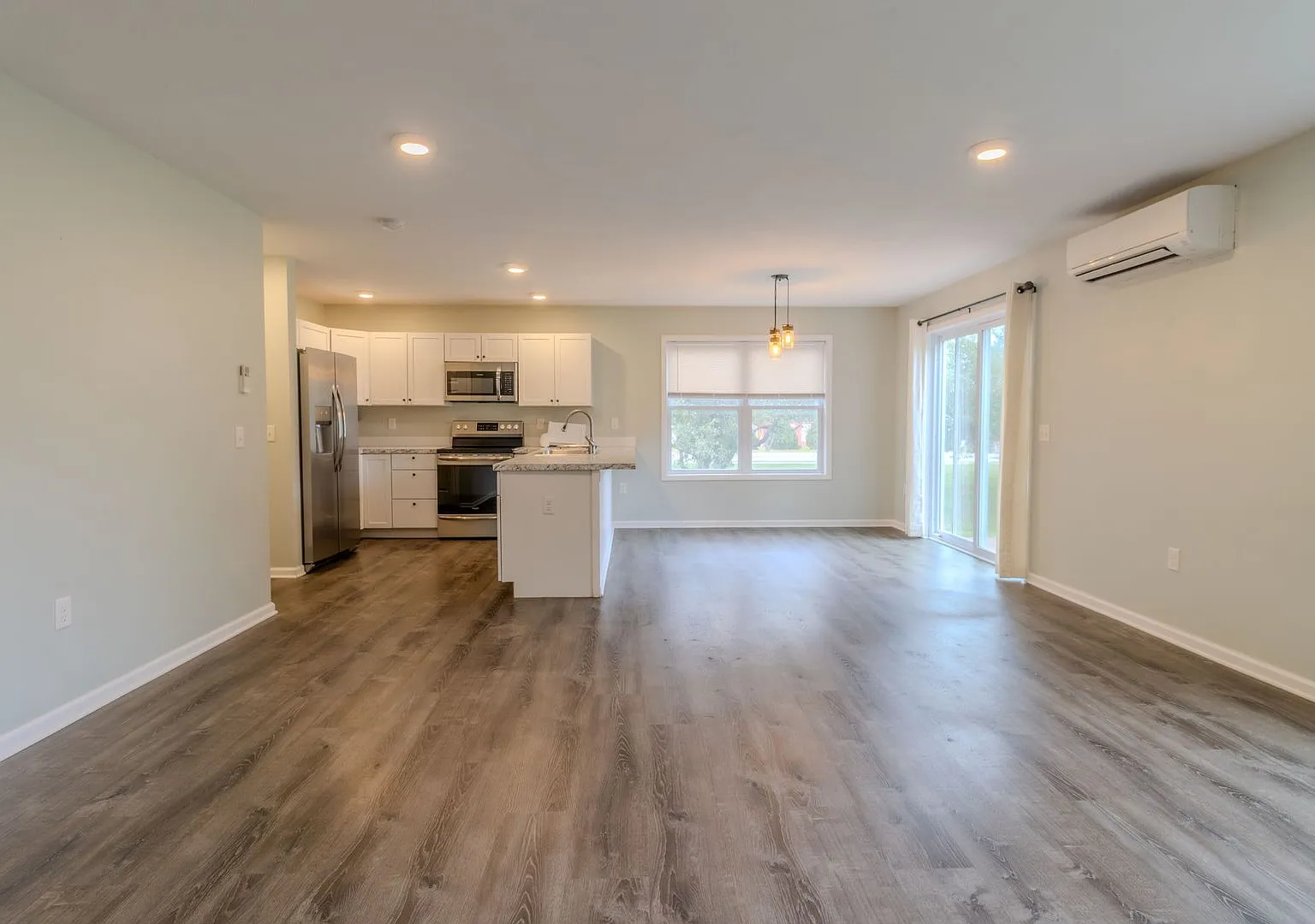 Stylish End-Unit Living | 3BR + 2.5BA — Photo 3