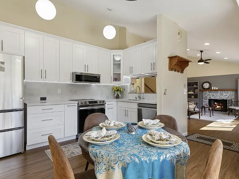 Stylish kitchen with dining area.