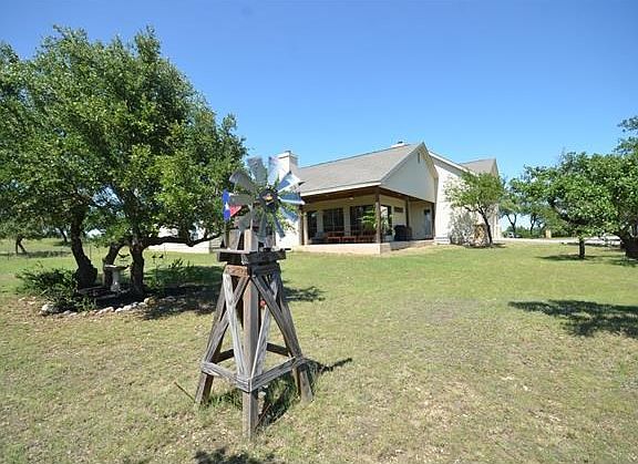 spacious backyard, level with plenty of room for a pool