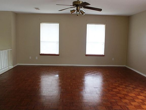 The Spacious Family room has parquet flooring.