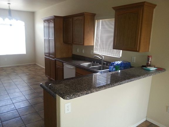 Kitchen counters and cabinets viewed from Living room