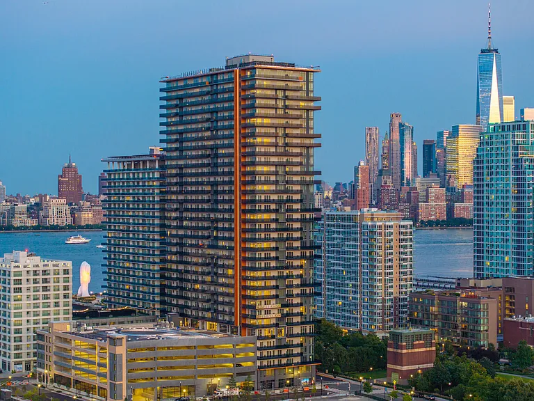 Experience the magic of twilight with breathtaking aerial views over the city