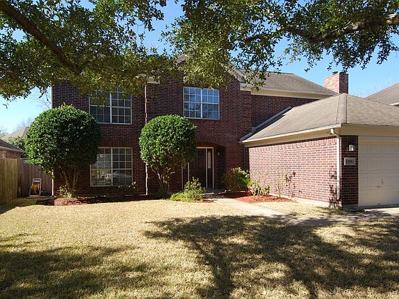 Attractive curb appeal on this tree lined street.