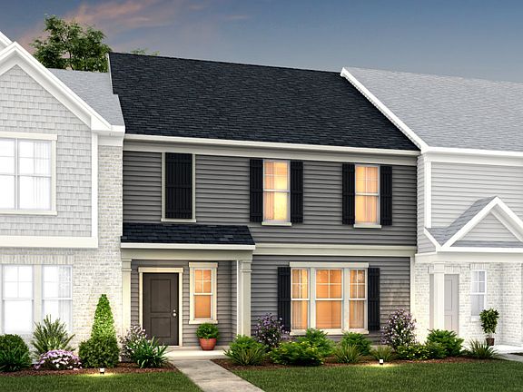 Palmer Exterior 7 features siding, covered front door and 2 car rear load garage